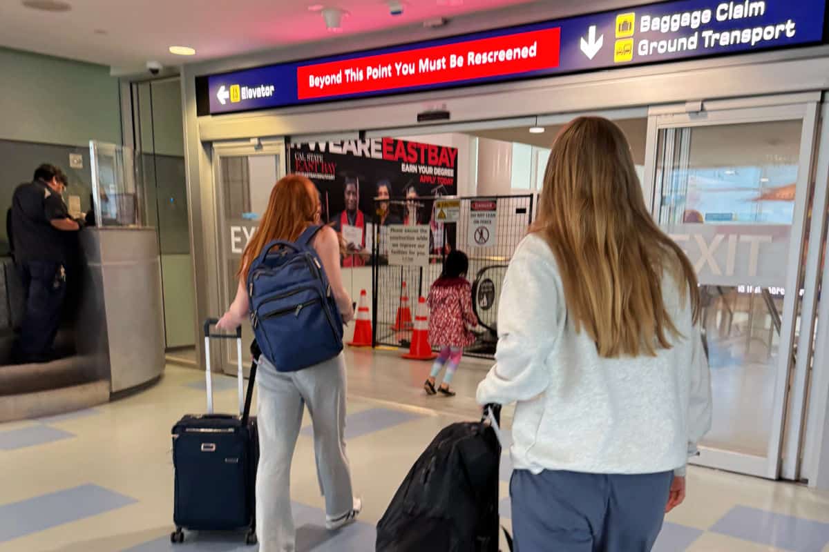 Teens Exiting Airport to Baggage Claim